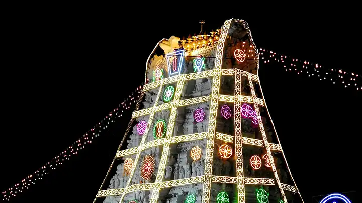 Front view of Tirumala Temple gopuram decorated for Tirumala Tirupati Vaikunta Ekadashi celebrations.